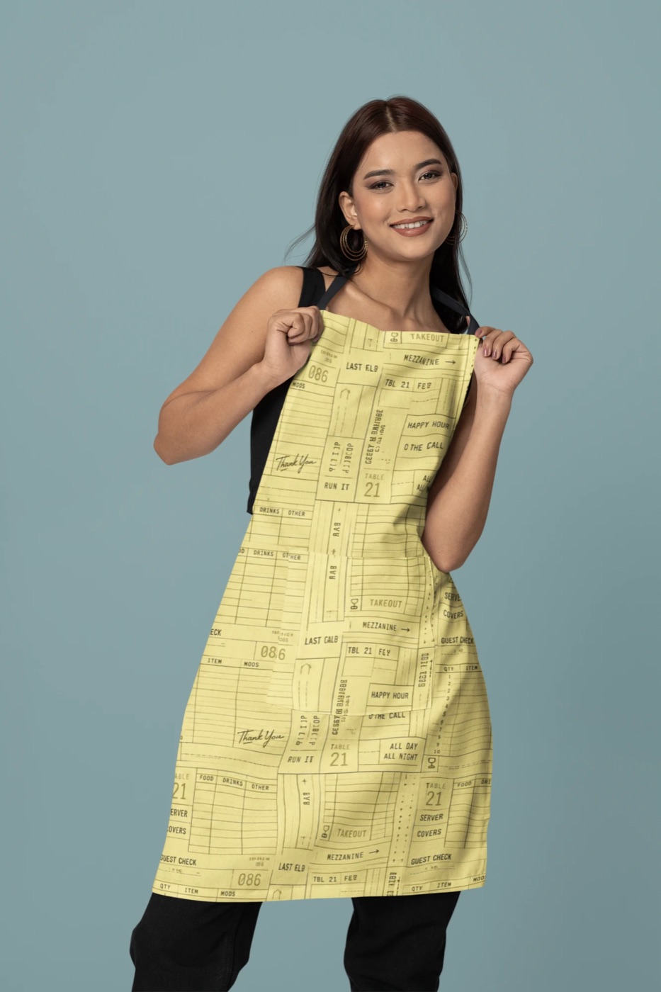 Guest Check in Ticket colorway on an apron